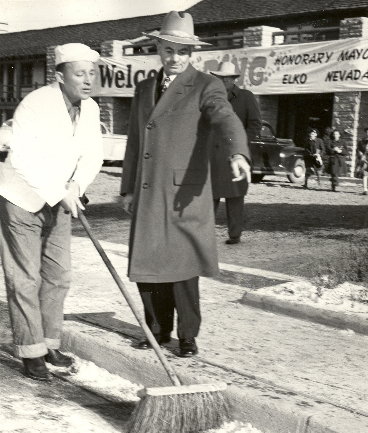 Bing sweeping the street.