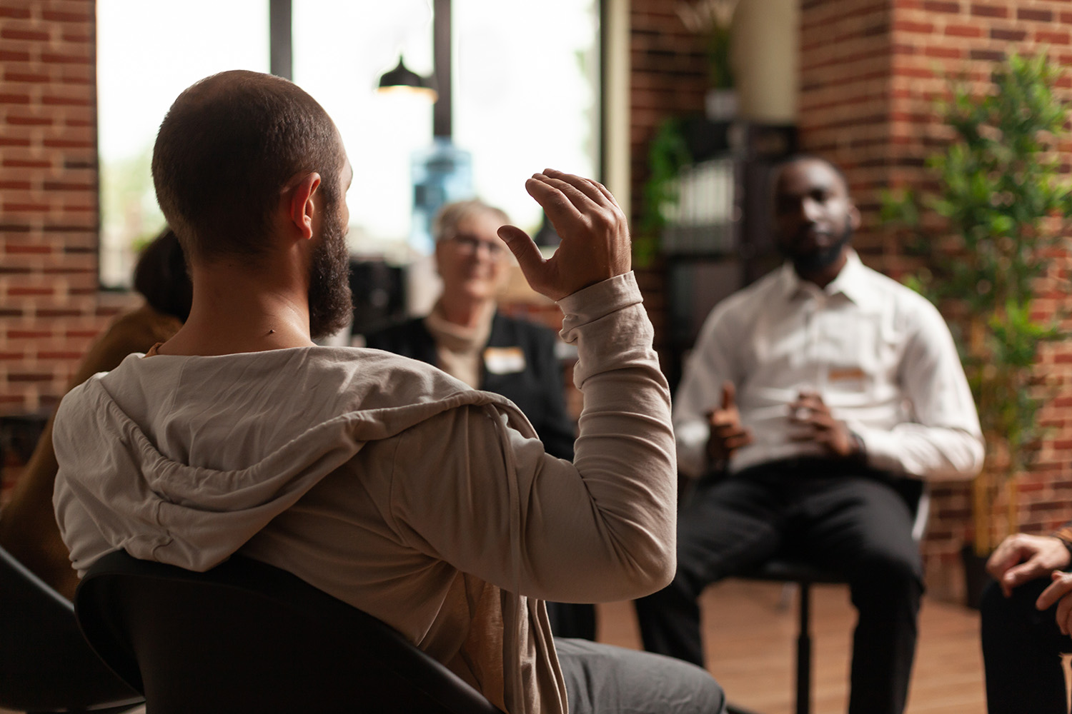 Addiction Counseling Man with addiction sharing mental health issues